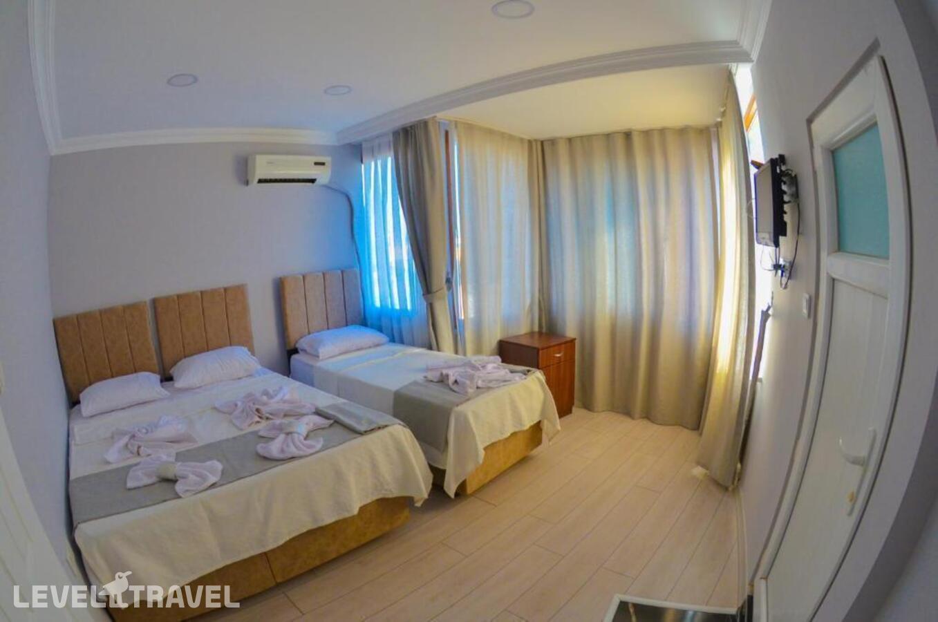 фотографии номера Трехместный номер отеля Yasmin Hotel в Турция(Фатих) - фото №7