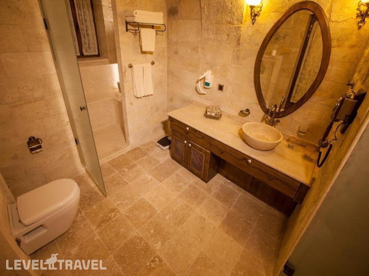 фотографии номера Люкс отеля Kayakapi Premium Caves Cappadocia Hotel в Турция(Ургюп) - фото №7