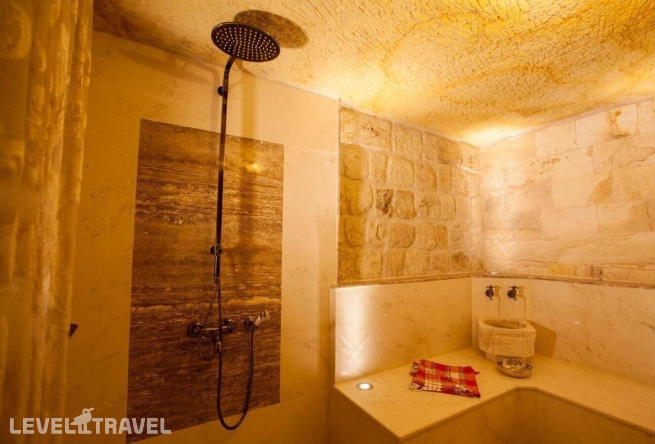 фотографии номера Люкс отеля Kayakapi Premium Caves Cappadocia Hotel в Турция(Ургюп) - фото №10