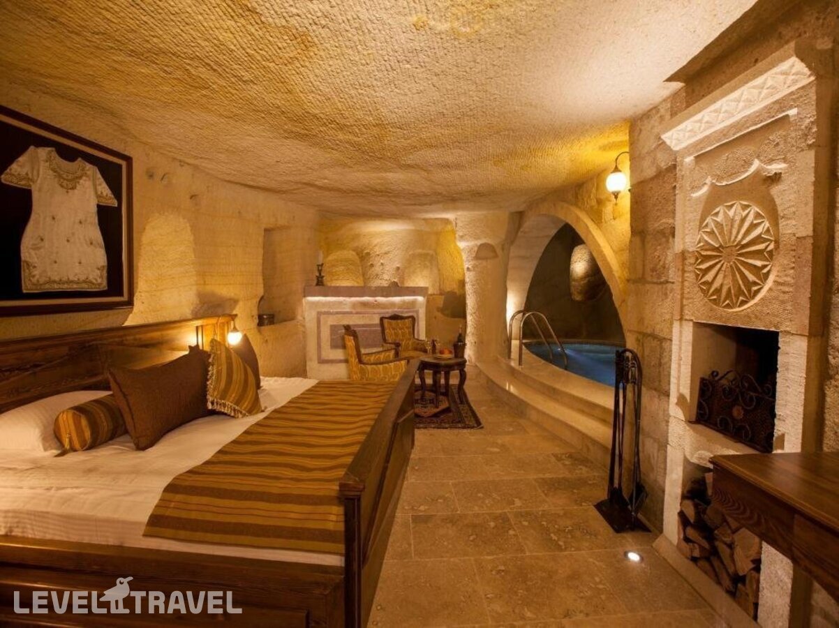 фотографии номера Люкс отеля Kayakapi Premium Caves Cappadocia Hotel в Турция(Ургюп) - фото №5