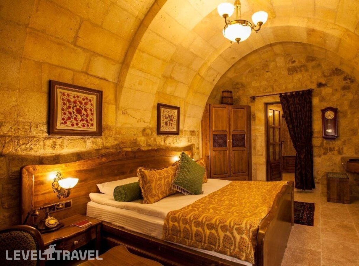 фотографии номера Люкс отеля Kayakapi Premium Caves Cappadocia Hotel в Турция(Ургюп) - фото №9