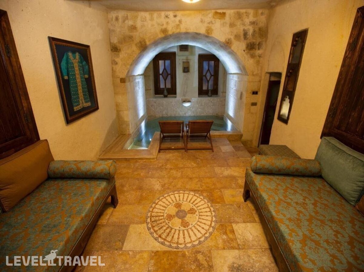 фотографии номера Люкс отеля Kayakapi Premium Caves Cappadocia Hotel в Турция(Ургюп) - фото №3