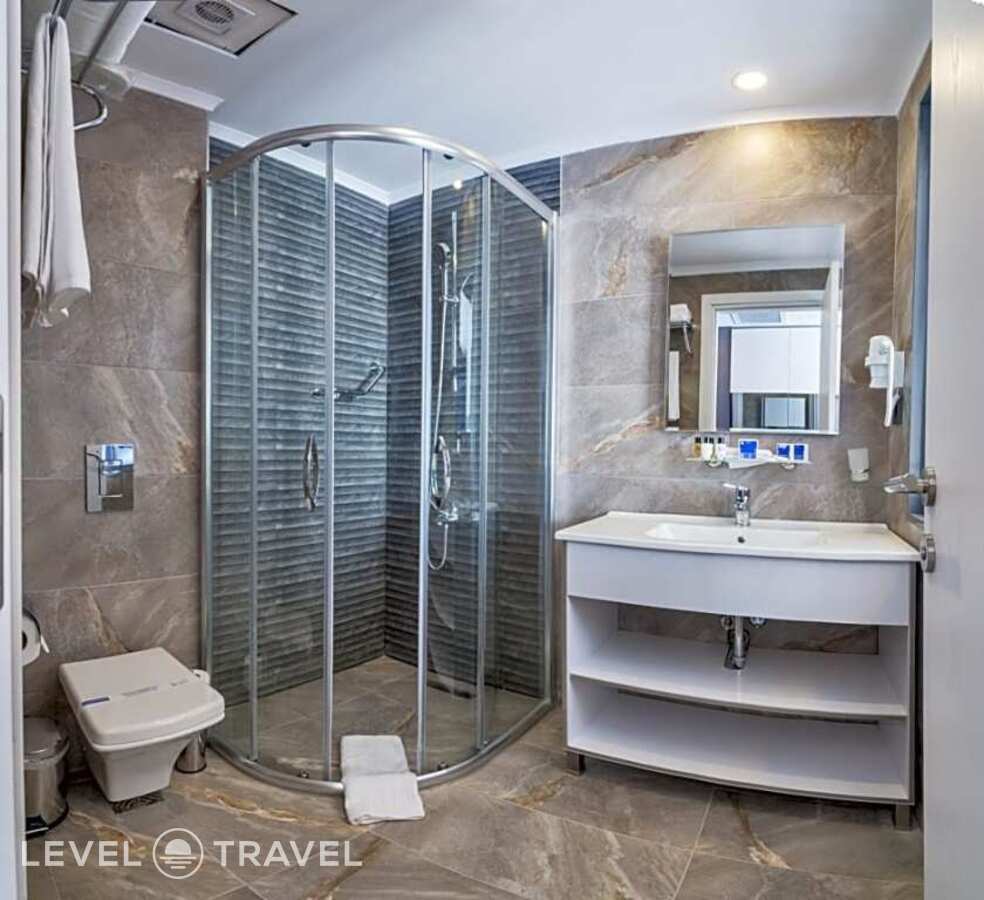 фотографии номера Стандартный номер отеля Inntel Hotel Istanbul в Турция(Таксим) - фото №1