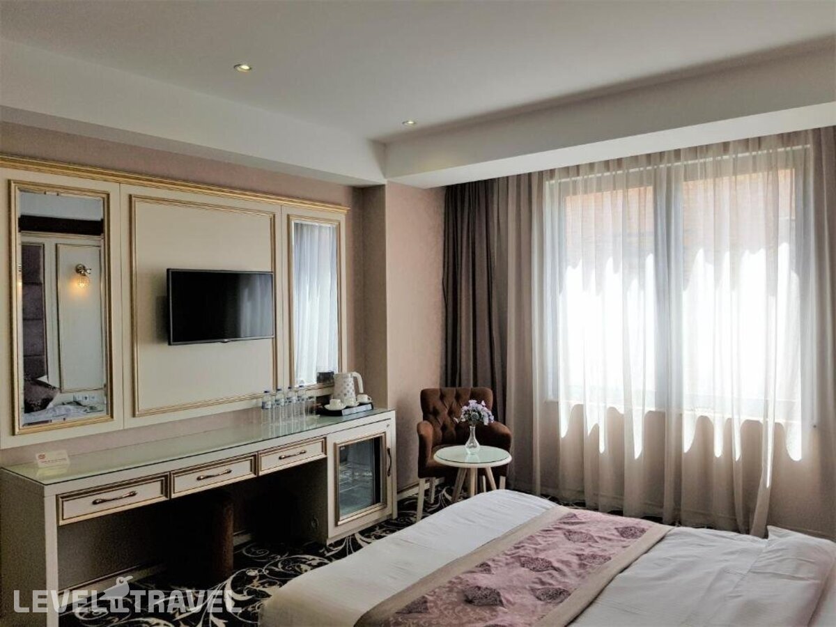 фотографии номера Четырехместный номер отеля Gold Tbilisi Hotel в Грузия(Тбилиси) - фото №2