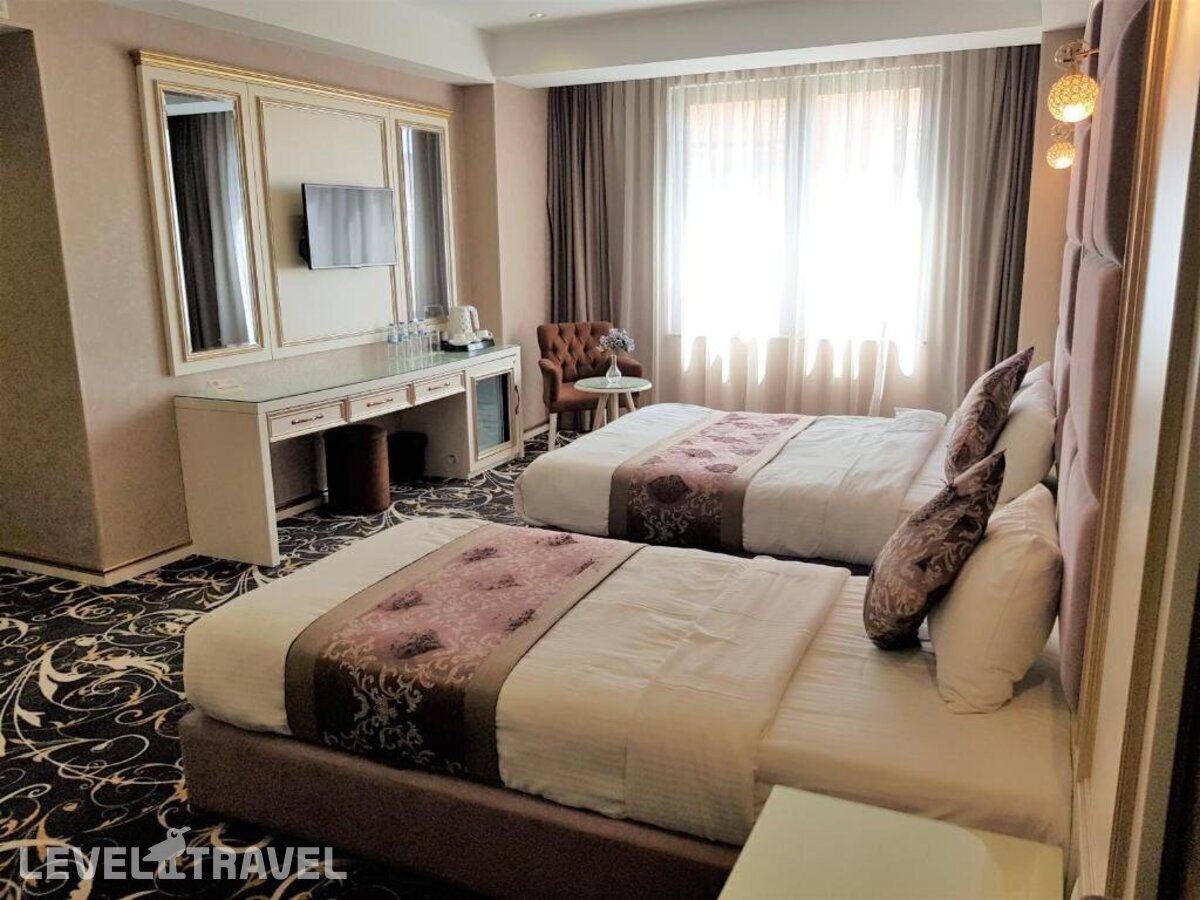фотографии номера Четырехместный номер отеля Gold Tbilisi Hotel в Грузия(Тбилиси) - фото №5