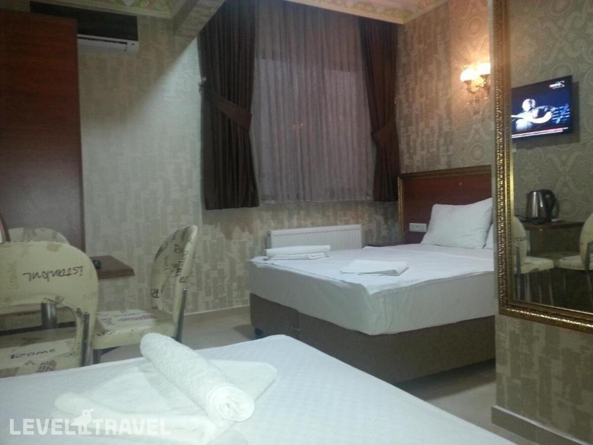 фотографии номера Трехместный номер отеля Rio Hotel в Турция(Лалели) - фото №2