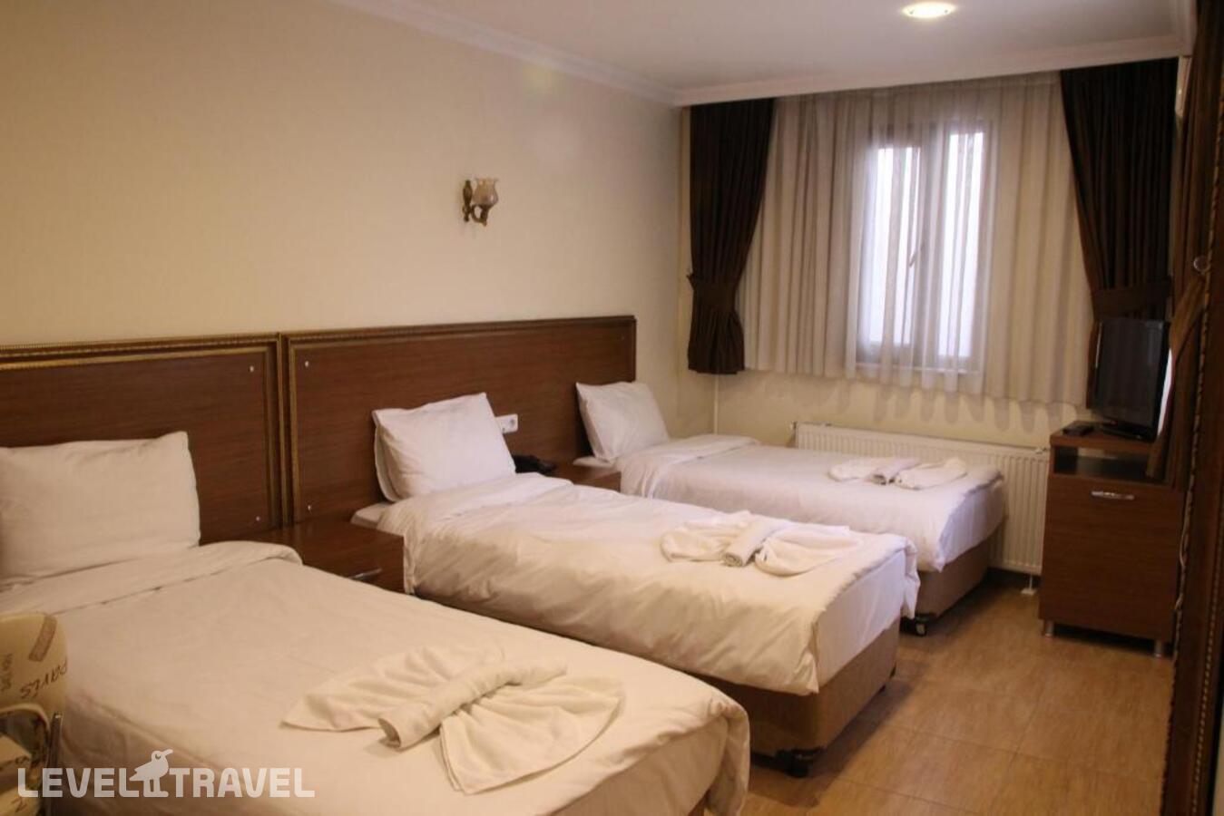 фотографии номера Трехместный номер отеля Rio Hotel в Турция(Лалели) - фото №7