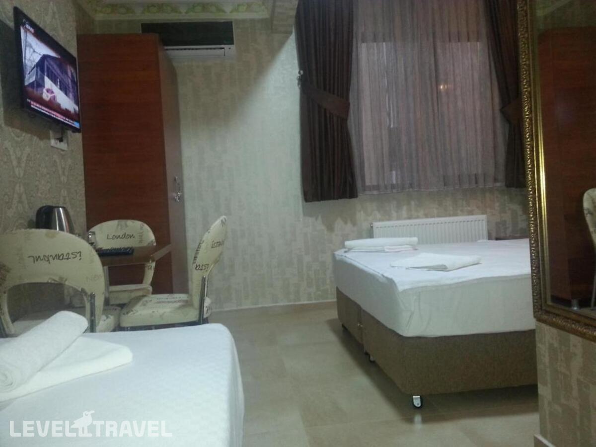 фотографии номера Трехместный номер отеля Rio Hotel в Турция(Лалели) - фото №4