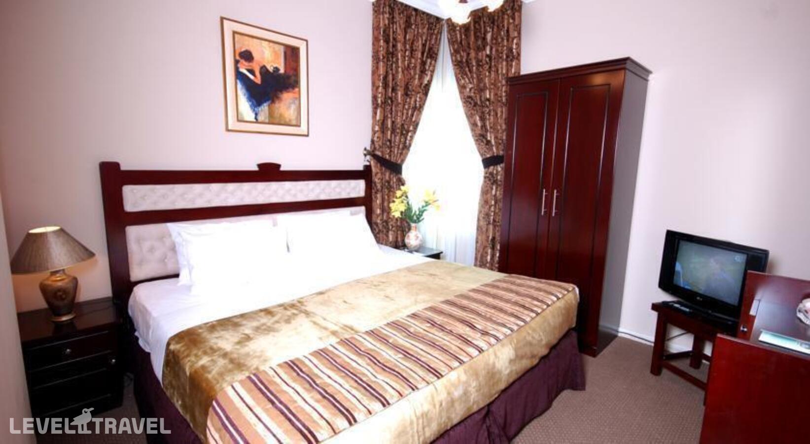 фотографии номера Стандартный номер отеля Al Bustan Tower Hotel Suites в ОАЭ(Шарджа) - фото №1