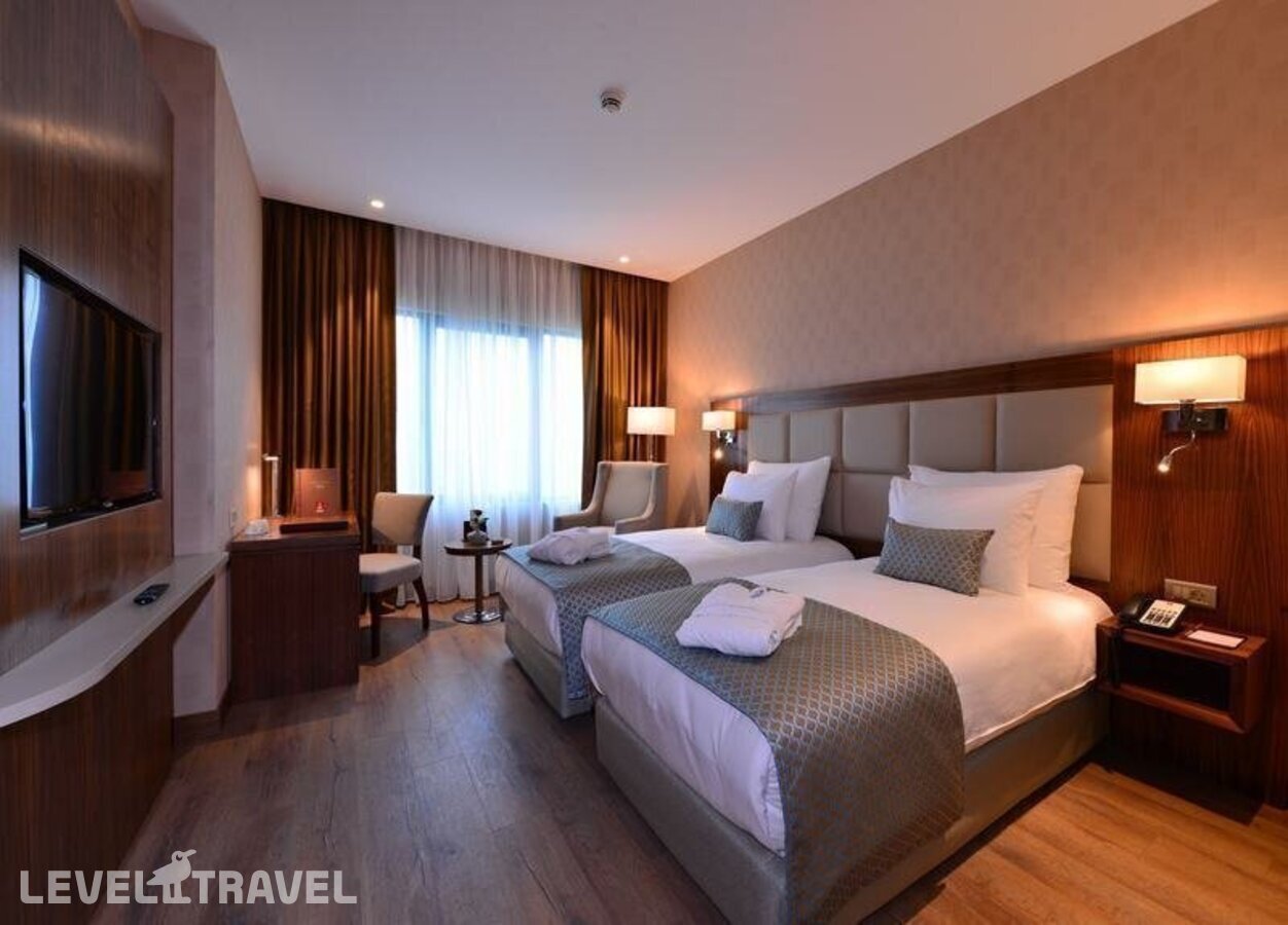 фотографии номера Стандартный номер отеля Clarion Hotel Istanbul Mahmutbey в Турция(Багджылар) - фото №4