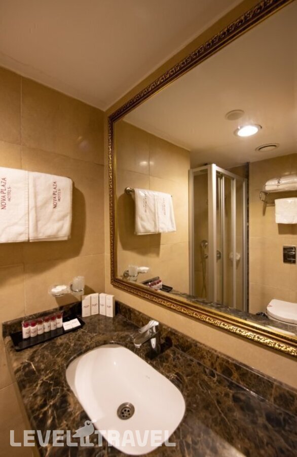 фотографии номера Трехместный номер отеля Aven Hotel (Ex. Nova Plaza Taksim Square) в Турция(Бейоглу) - фото №4