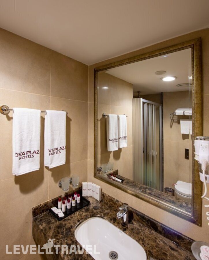 фотографии номера Трехместный номер отеля Aven Hotel (Ex. Nova Plaza Taksim Square) в Турция(Бейоглу) - фото №3