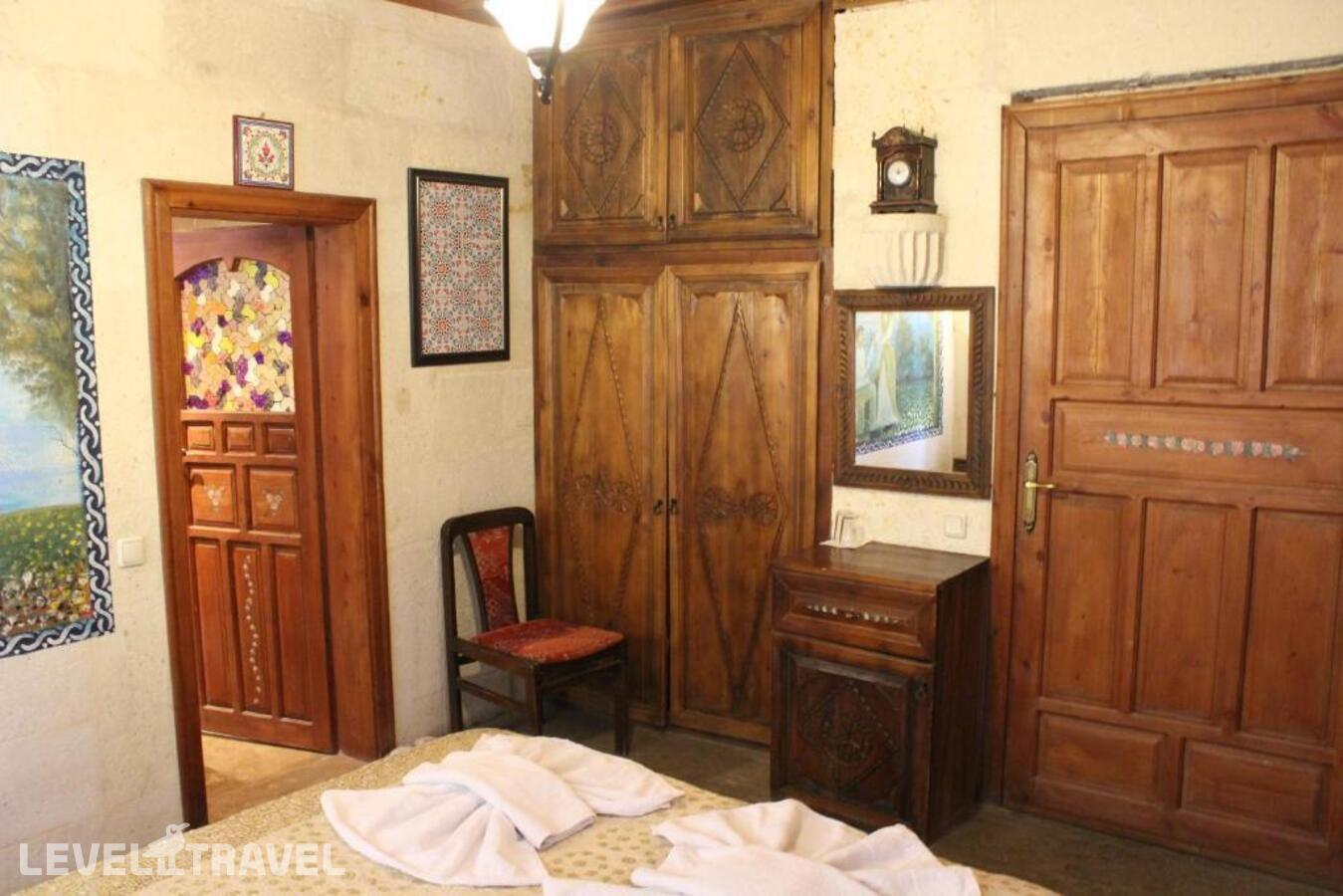 фотографии номера Делюкс отеля Kismet Cave House Boutique в Турция(Гёреме) - фото №1