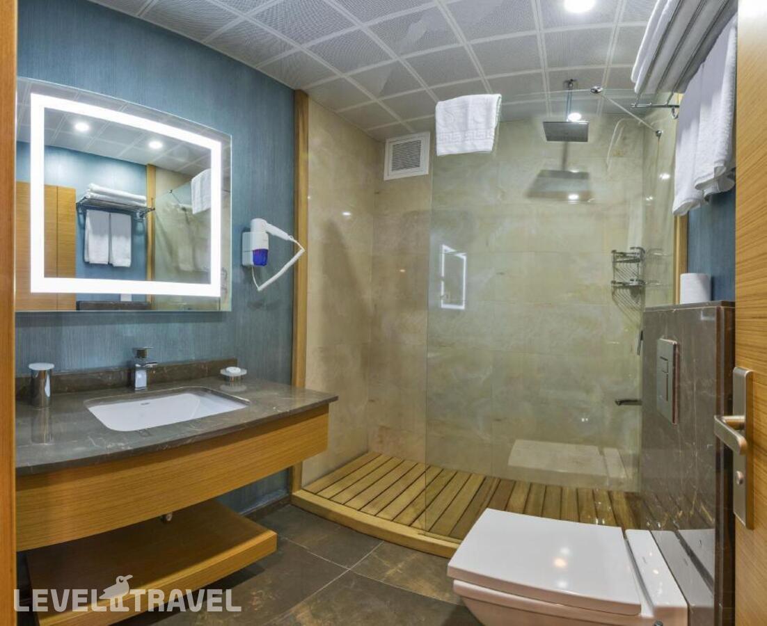фотографии номера Трехместный номер отеля Bisetun Hotel в Турция(Фатих) - фото №1