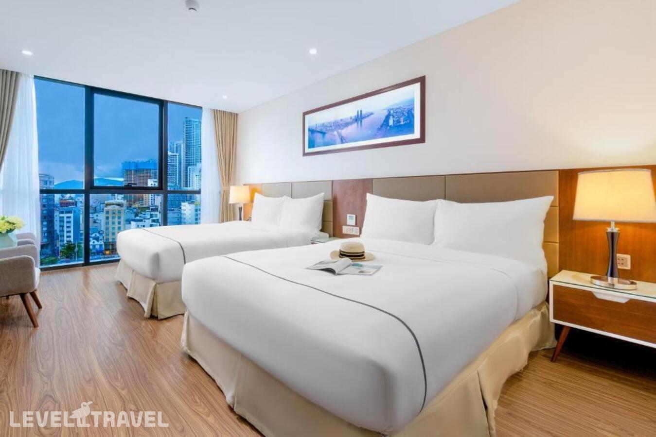 фотографии номера Семейный люкс отеля Pavilion Hotel Danang в Вьетнам(Дананг) - фото №3