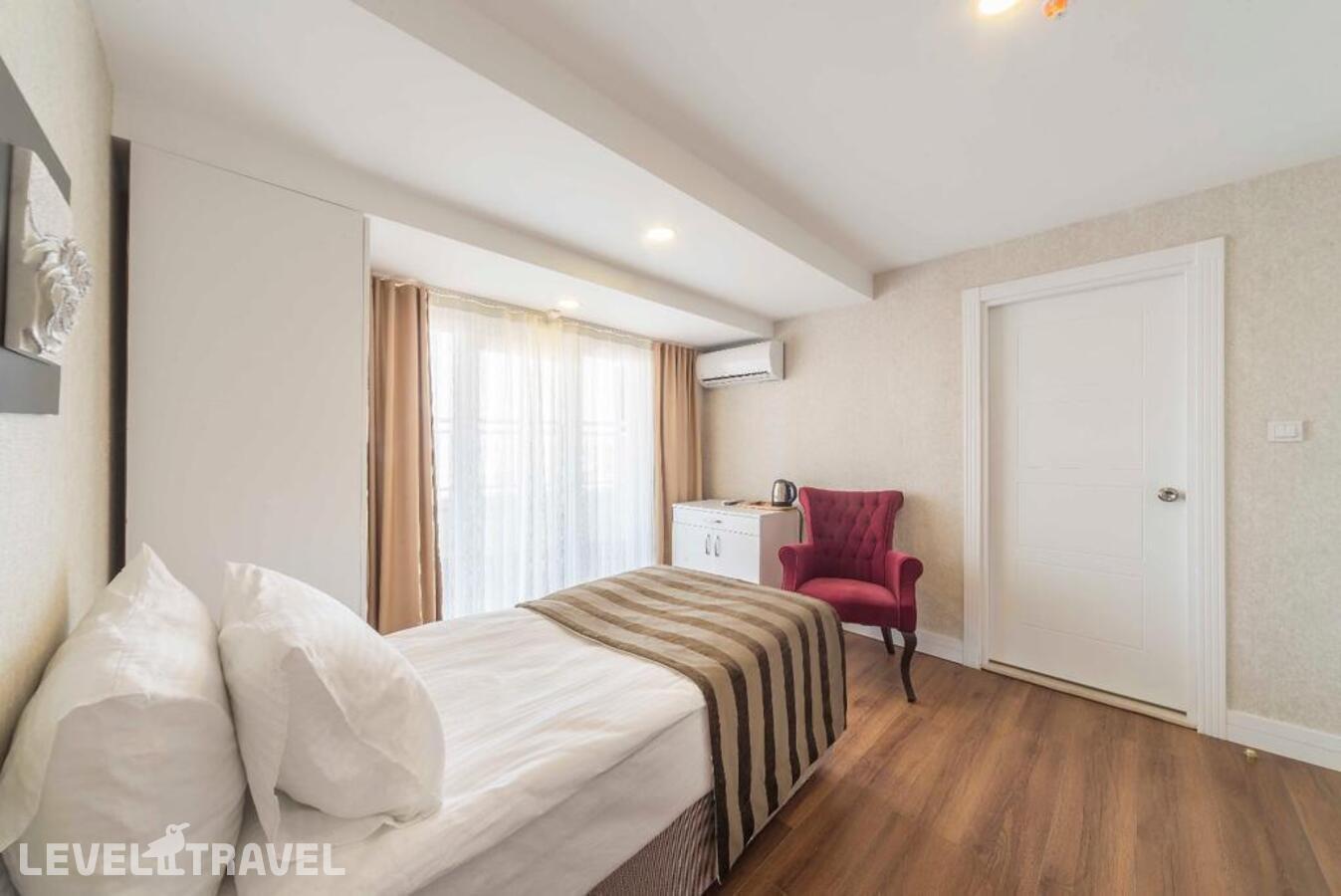 фотографии номера Одноместный номер отеля Kunlun Kensington Hotel в Турция(Фатих) - фото №3