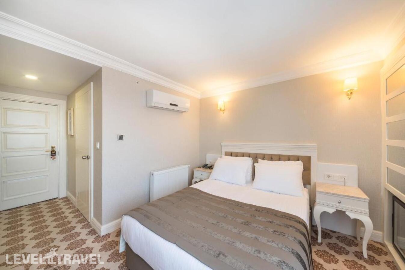 фотографии номера Одноместный номер отеля Kunlun Kensington Hotel в Турция(Фатих) - фото №1