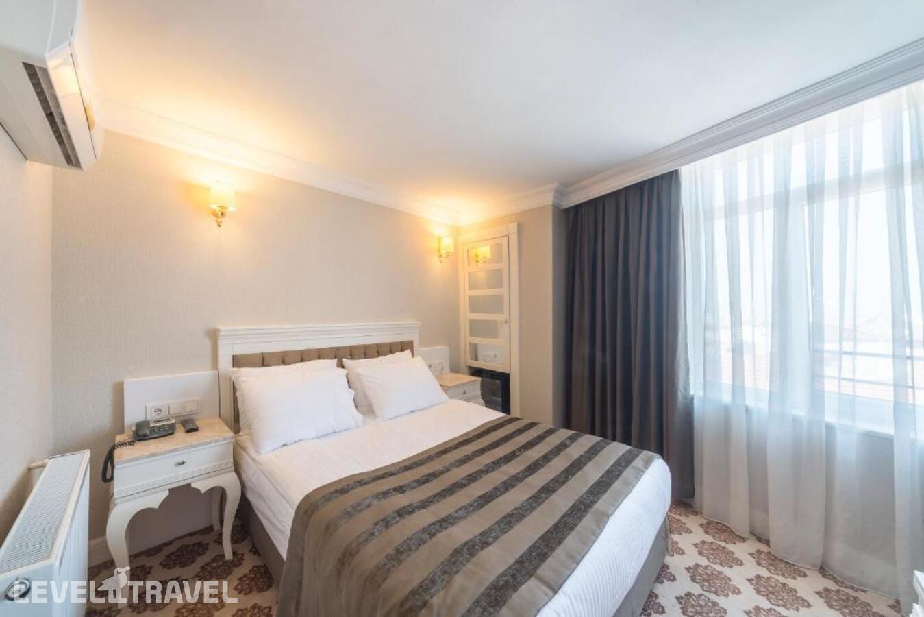 фотографии номера Одноместный номер отеля Kunlun Kensington Hotel в Турция(Фатих) - фото №2