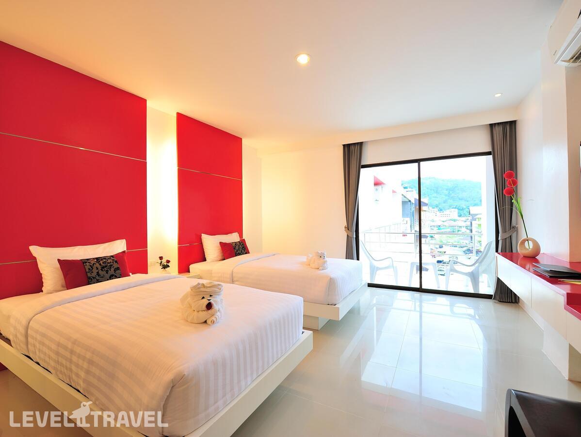 фотографии номера Делюкс отеля Alfresco Phuket Hotel в Таиланд(Патонг Бич) - фото №3