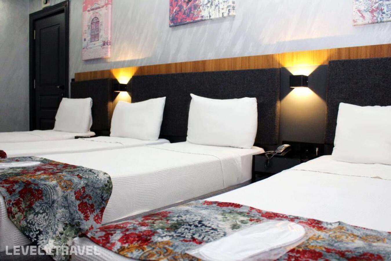 фотографии номера Четырехместный делюкс отеля Istanbul Fair Hotel в Турция(Кючюкчекмедже) - фото №8
