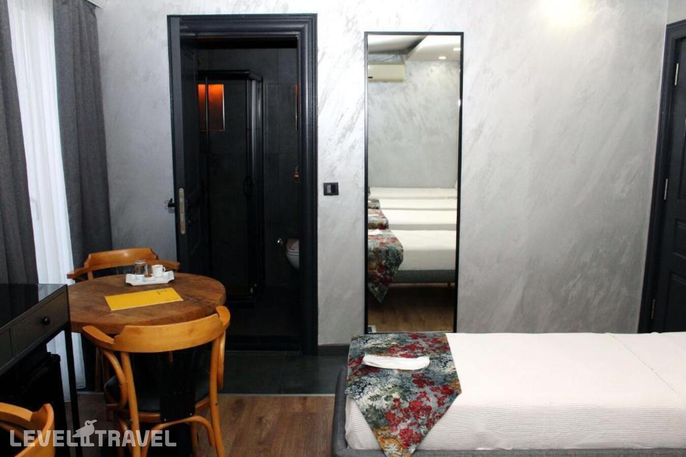 фотографии номера Четырехместный делюкс отеля Istanbul Fair Hotel в Турция(Кючюкчекмедже) - фото №9