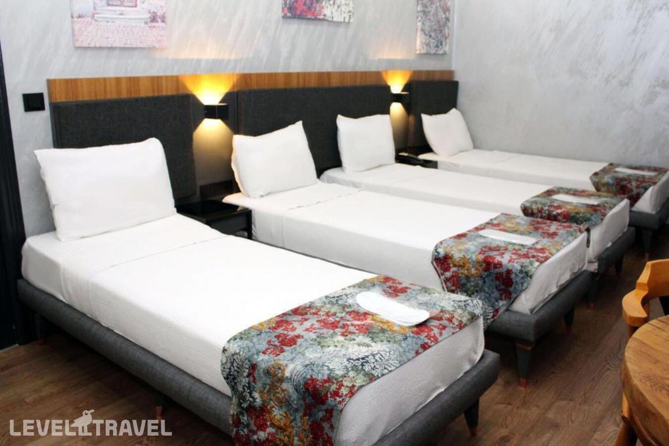 фотографии номера Четырехместный делюкс отеля Istanbul Fair Hotel в Турция(Кючюкчекмедже) - фото №2