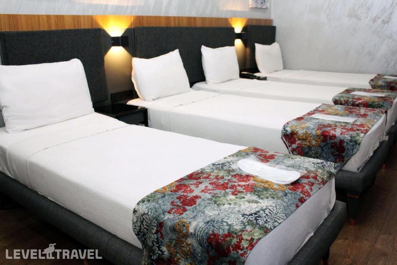 фотографии номера Четырехместный делюкс отеля Istanbul Fair Hotel в Турция(Кючюкчекмедже) - фото №3
