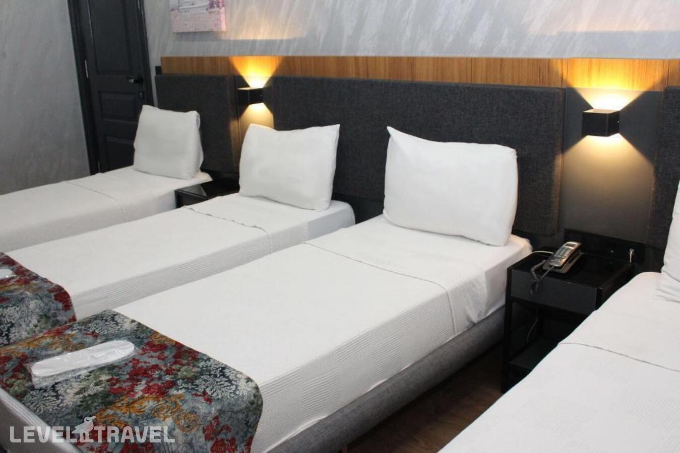 фотографии номера Четырехместный делюкс отеля Istanbul Fair Hotel в Турция(Кючюкчекмедже) - фото №7