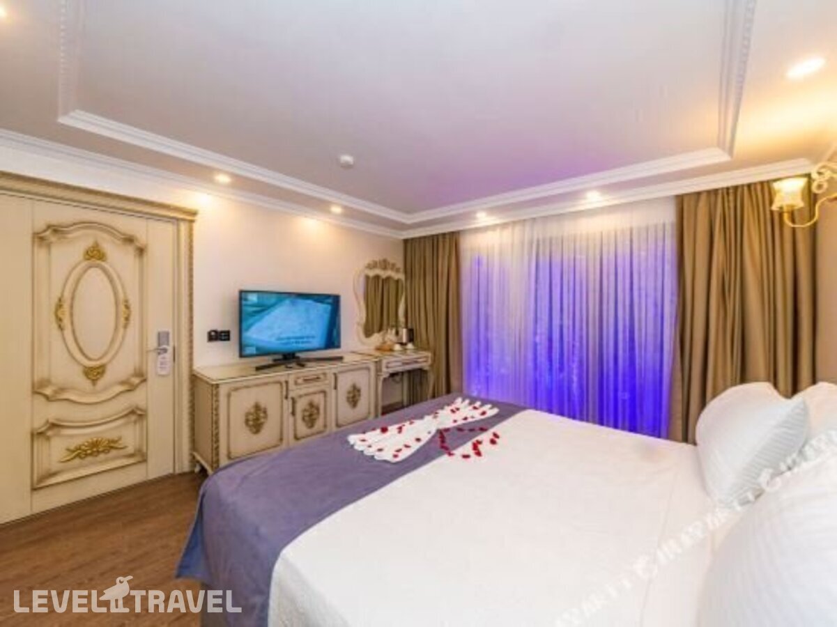 фотографии номера Стандартный номер отеля Czn Burak Hotel в Турция(Бейоглу) - фото №14