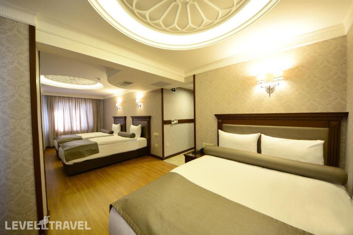 фотографии номера Трехместный номер отеля Grand Bazaar Hotel в Турция(Фатих) - фото №2