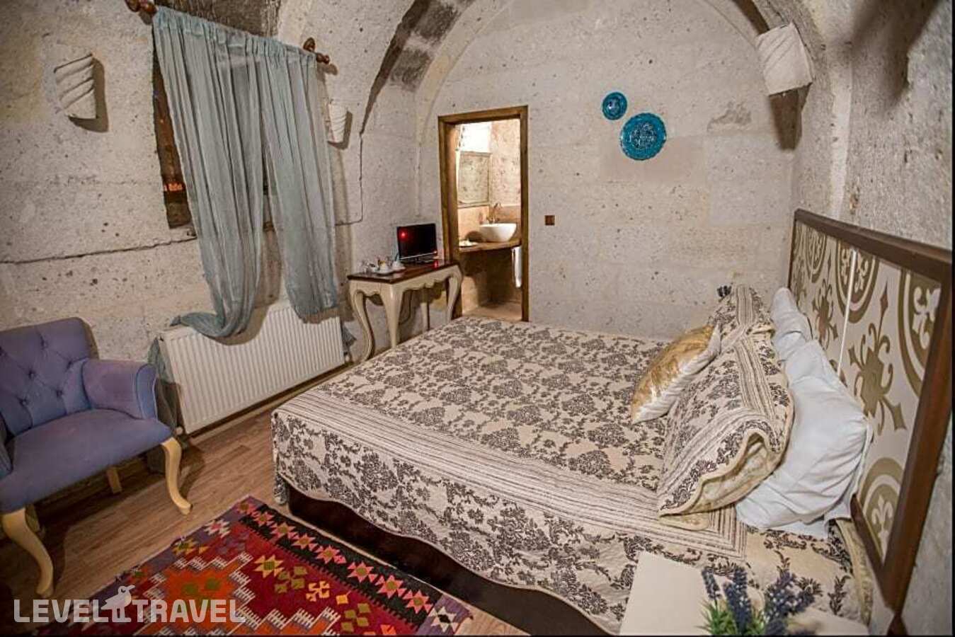 фотографии номера Стандартный номер отеля Sakli Konak Cappadocia Hotel в Турция(Учхисар) - фото №3