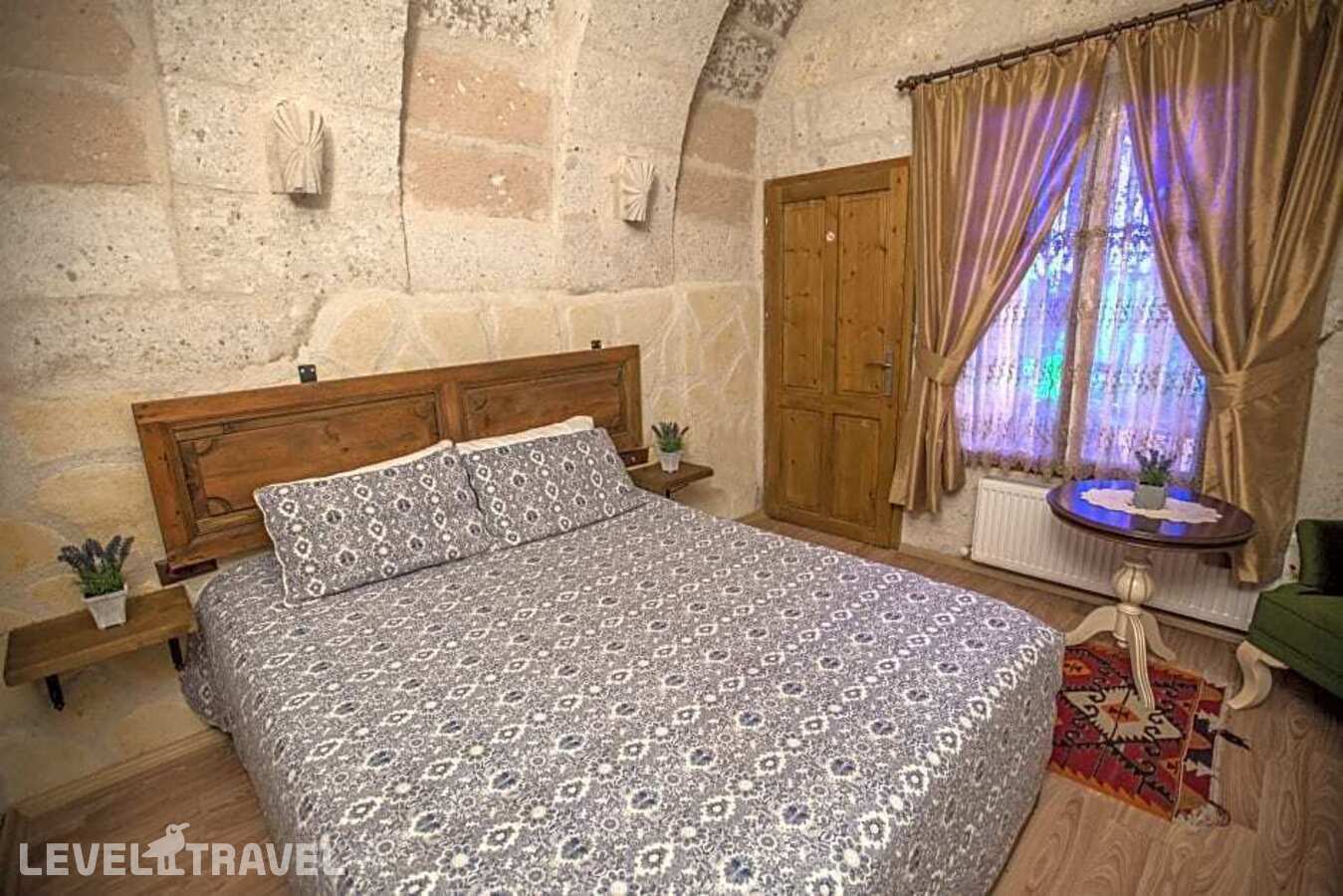 фотографии номера Стандартный номер отеля Sakli Konak Cappadocia Hotel в Турция(Учхисар) - фото №4