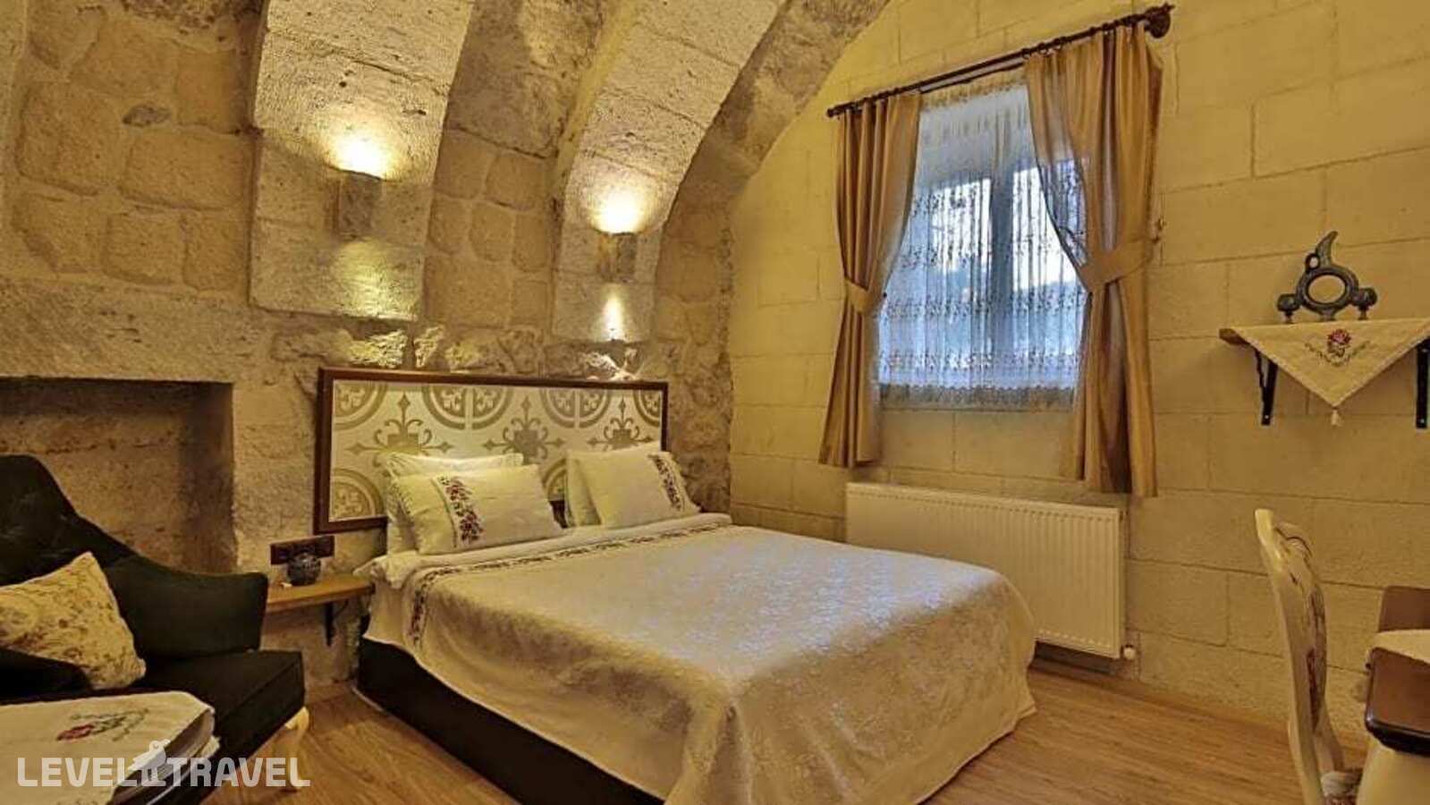 фотографии номера Стандартный номер отеля Sakli Konak Cappadocia Hotel в Турция(Учхисар) - фото №8
