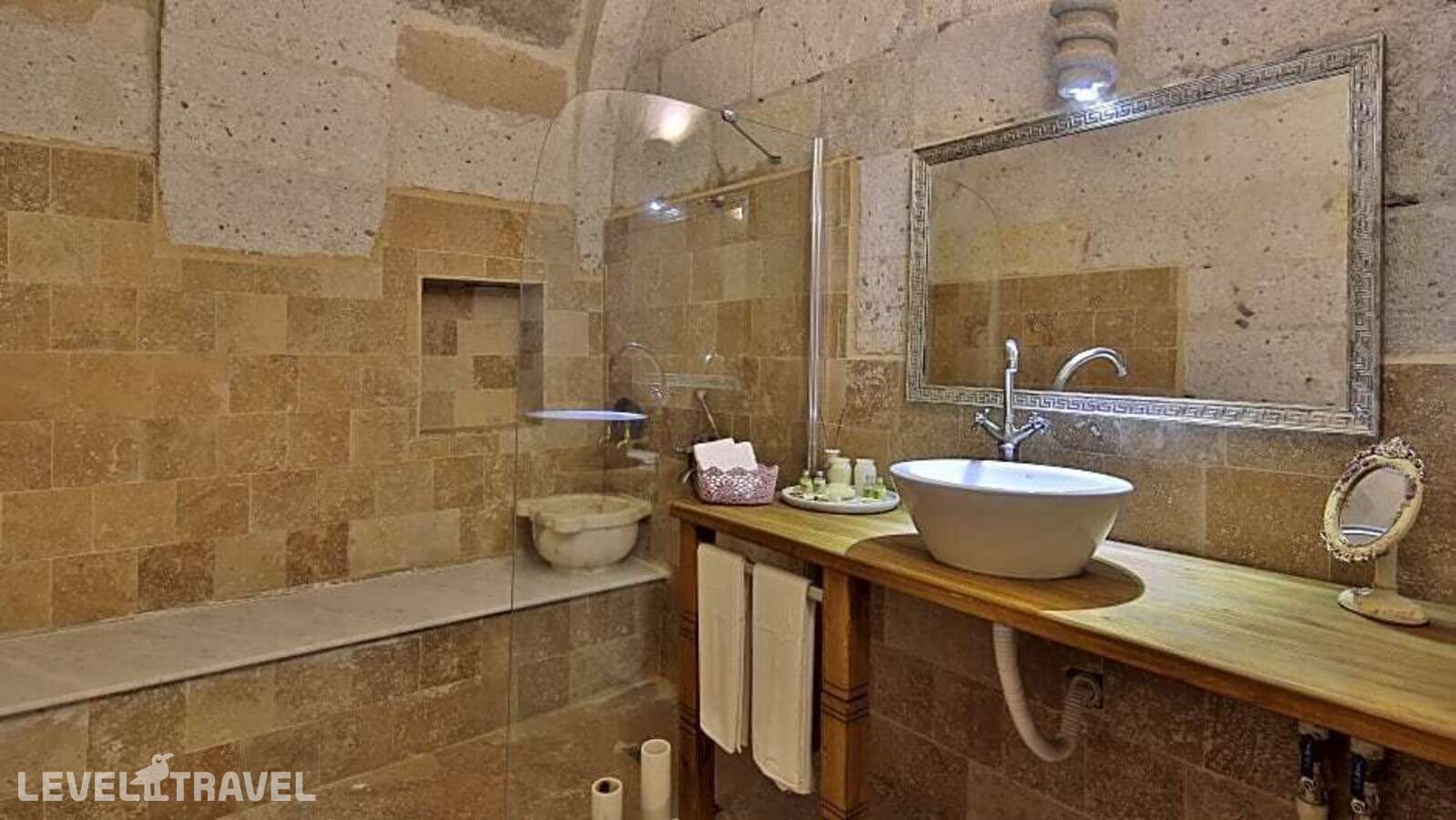 фотографии номера Делюкс отеля Sakli Konak Cappadocia Hotel в Турция(Учхисар) - фото №9