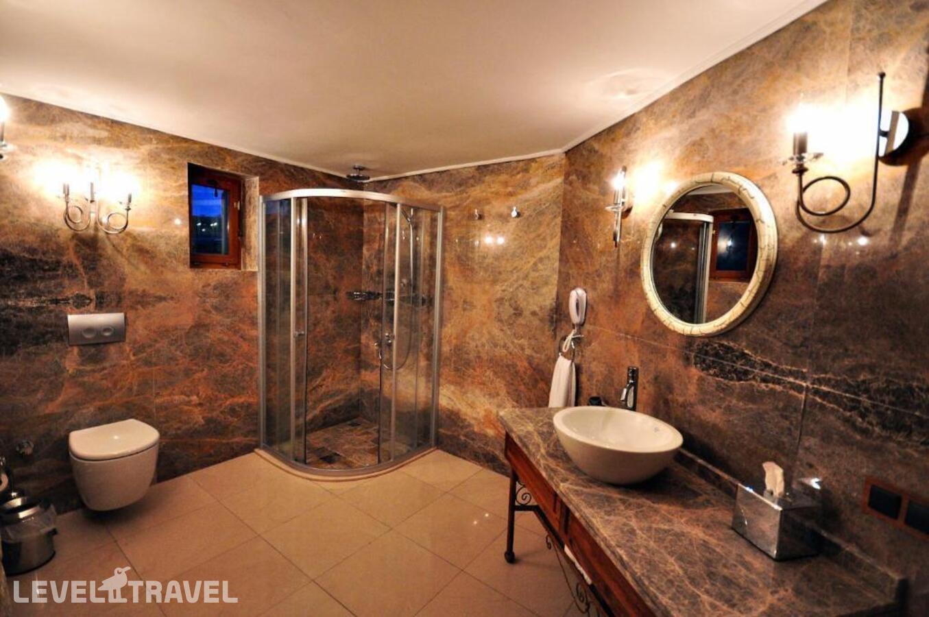 фотографии номера Улучшенный люкс отеля Tafoni Houses Cave Hotel в Турция(Ортахисар) - фото №47