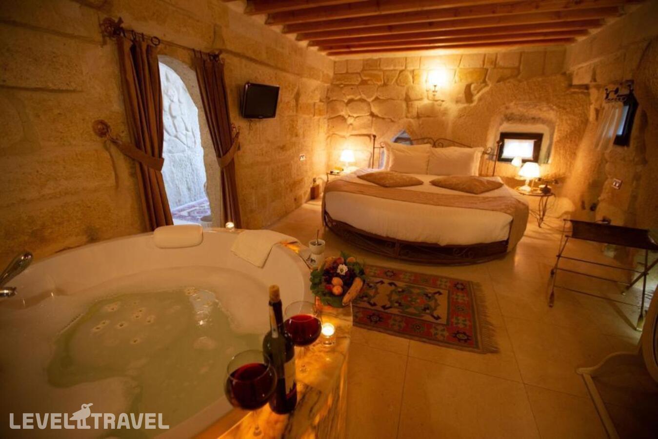 фотографии номера Улучшенный люкс отеля Tafoni Houses Cave Hotel в Турция(Ортахисар) - фото №32