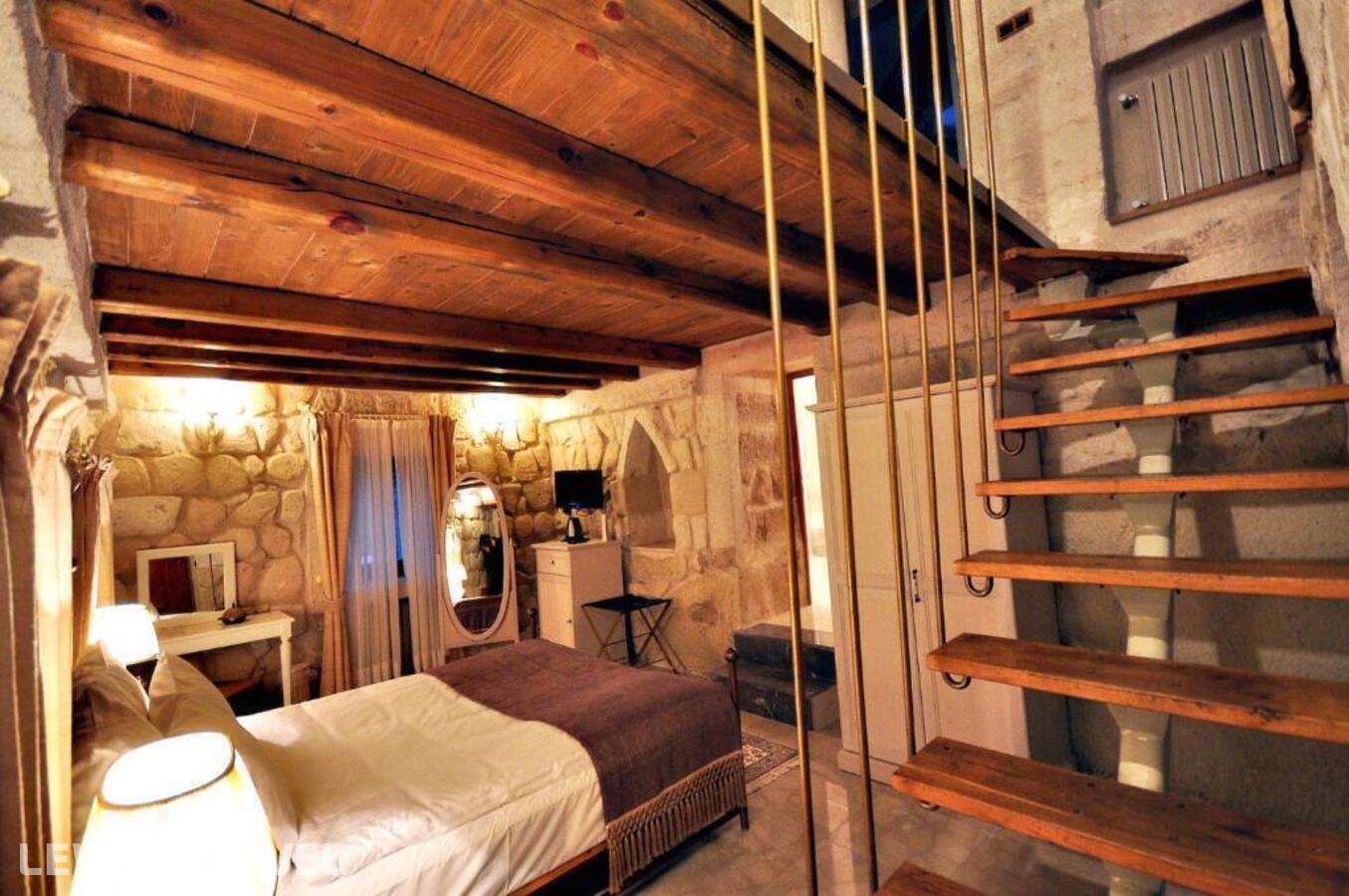 фотографии номера Улучшенный люкс отеля Tafoni Houses Cave Hotel в Турция(Ортахисар) - фото №48