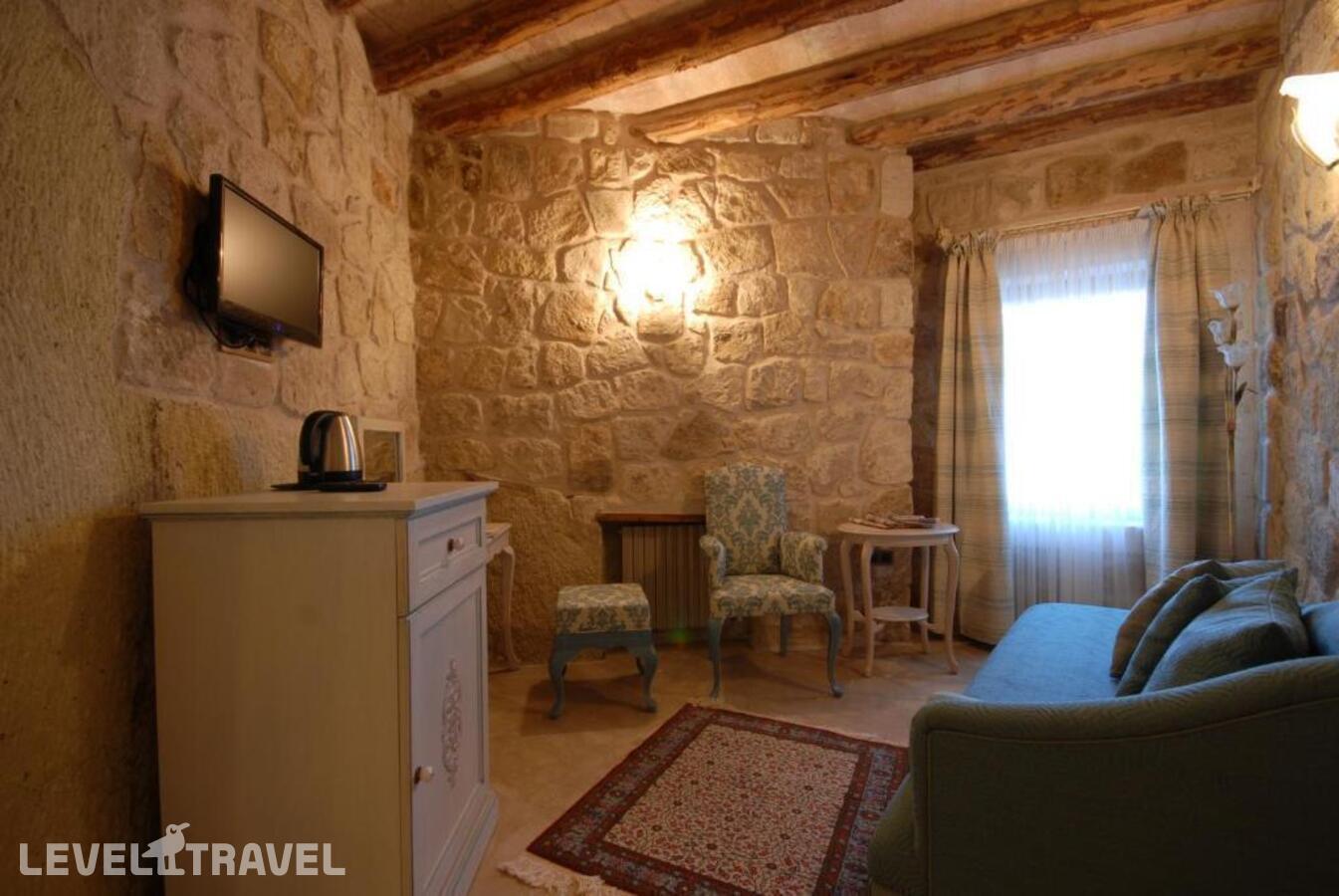 фотографии номера Улучшенный люкс отеля Tafoni Houses Cave Hotel в Турция(Ортахисар) - фото №9