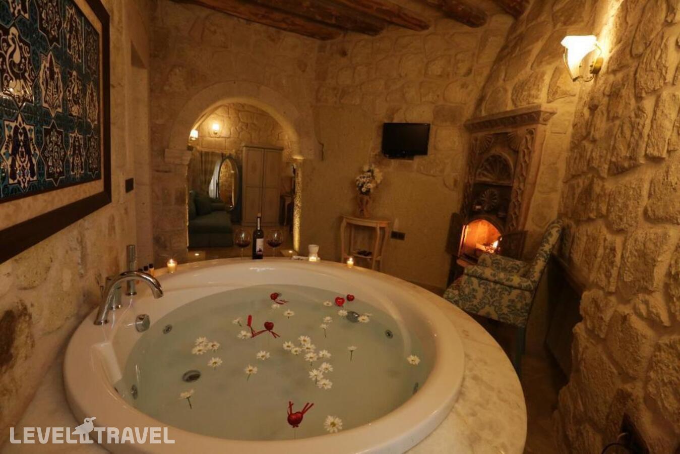 фотографии номера Улучшенный люкс отеля Tafoni Houses Cave Hotel в Турция(Ортахисар) - фото №18