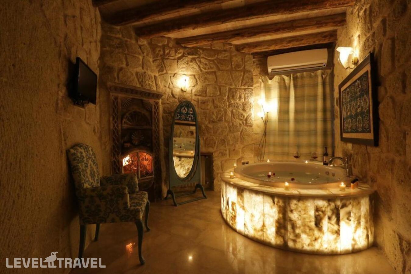 фотографии номера Улучшенный люкс отеля Tafoni Houses Cave Hotel в Турция(Ортахисар) - фото №28