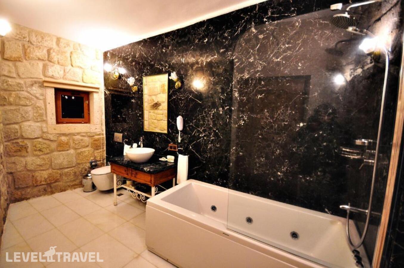 фотографии номера Улучшенный люкс отеля Tafoni Houses Cave Hotel в Турция(Ортахисар) - фото №42