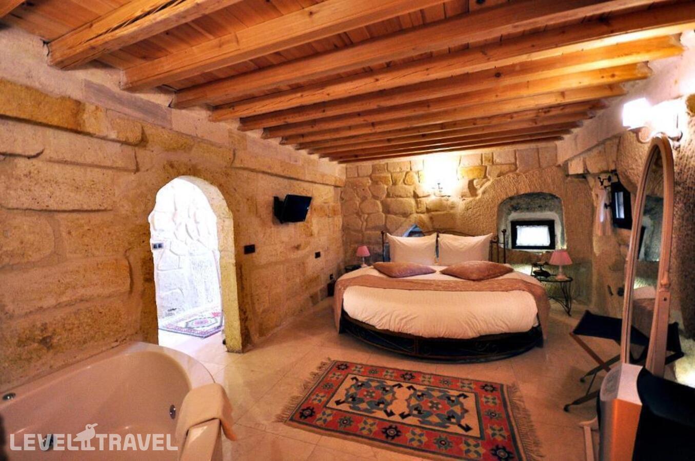 фотографии номера Улучшенный люкс отеля Tafoni Houses Cave Hotel в Турция(Ортахисар) - фото №40