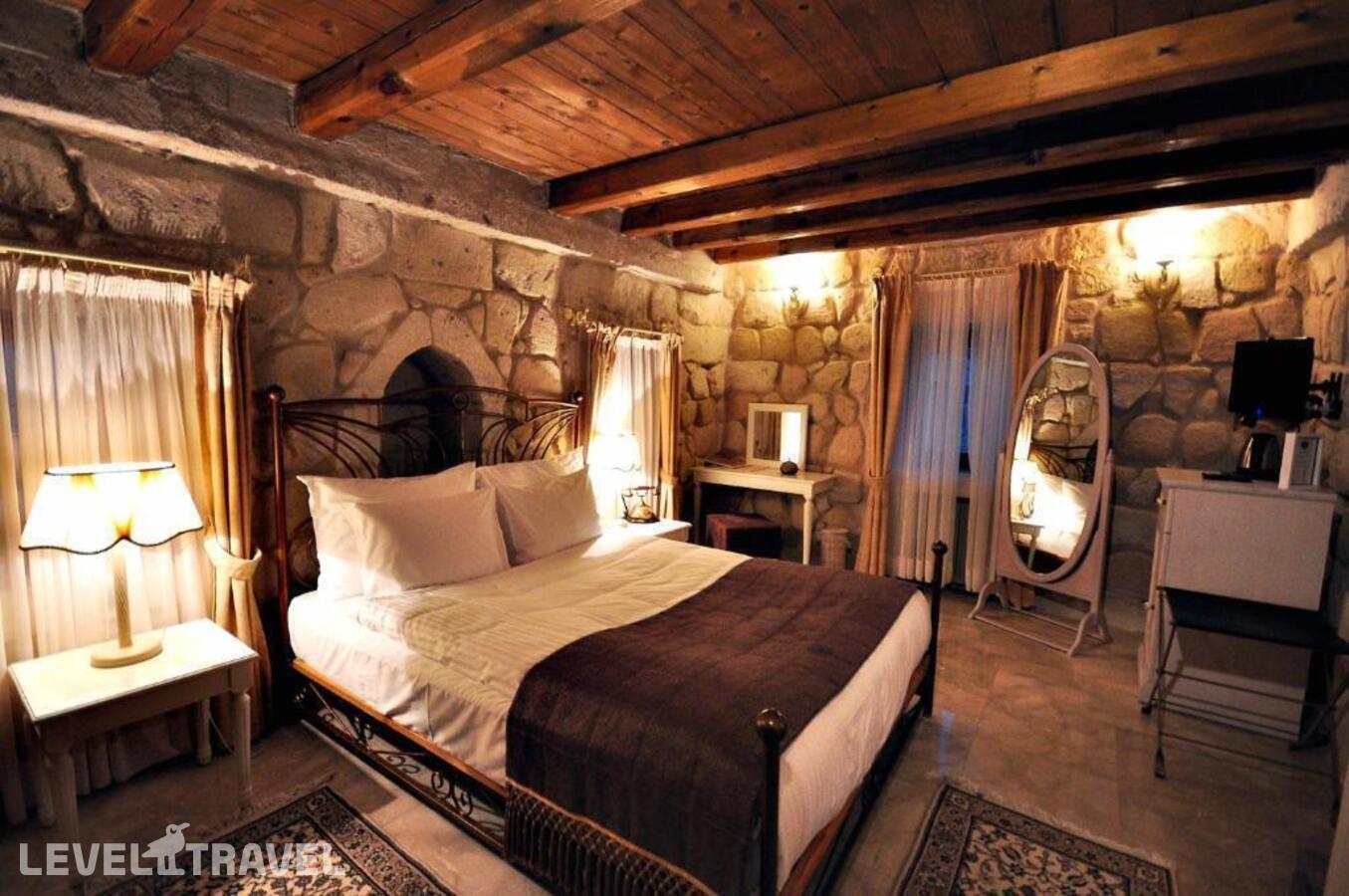 фотографии номера Улучшенный люкс отеля Tafoni Houses Cave Hotel в Турция(Ортахисар) - фото №46