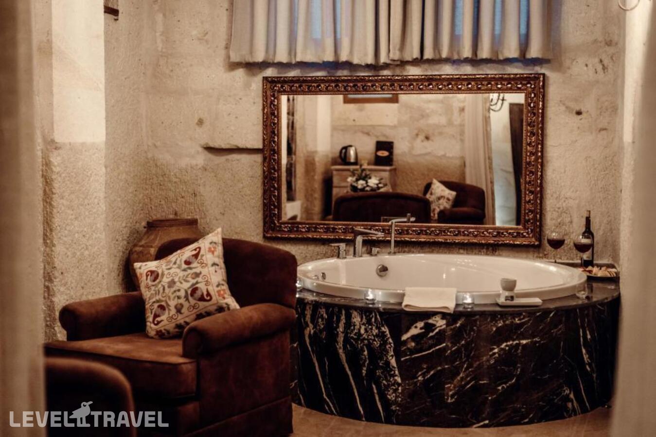 фотографии номера Люкс роскошный отеля Tafoni Houses Cave Hotel в Турция(Ортахисар) - фото №13