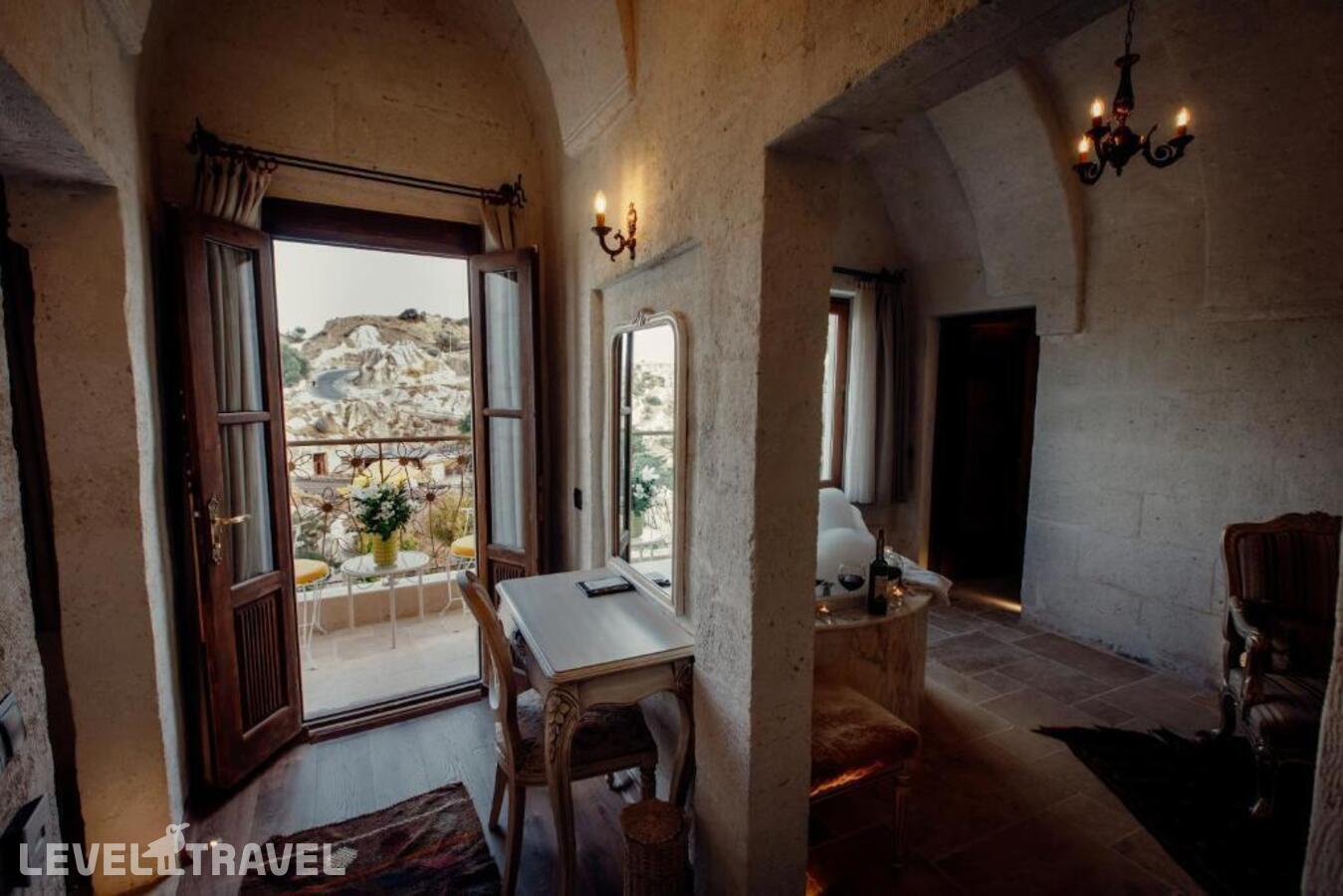 фотографии номера Люкс роскошный отеля Tafoni Houses Cave Hotel в Турция(Ортахисар) - фото №10