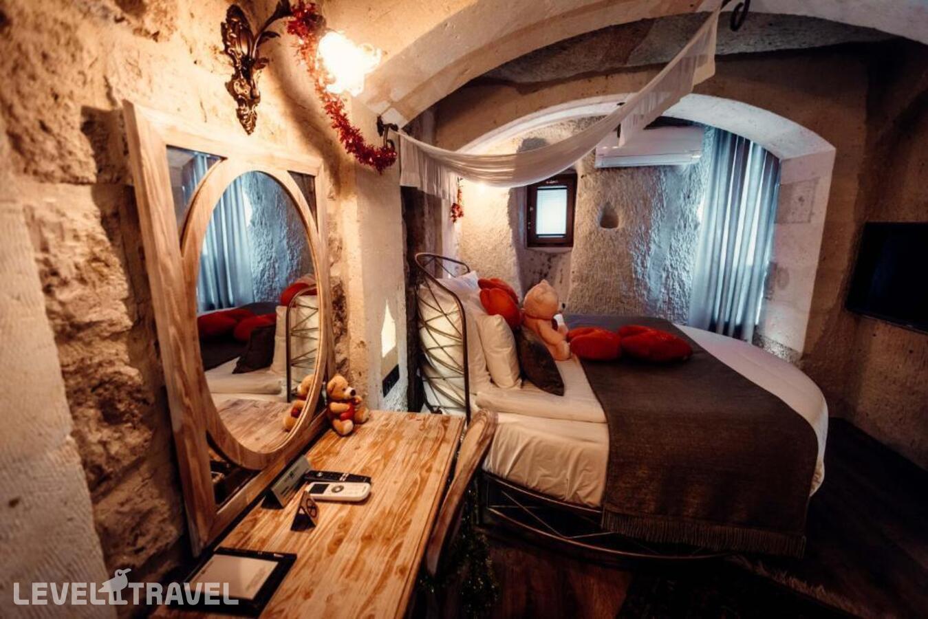 фотографии номера Люкс роскошный отеля Tafoni Houses Cave Hotel в Турция(Ортахисар) - фото №16