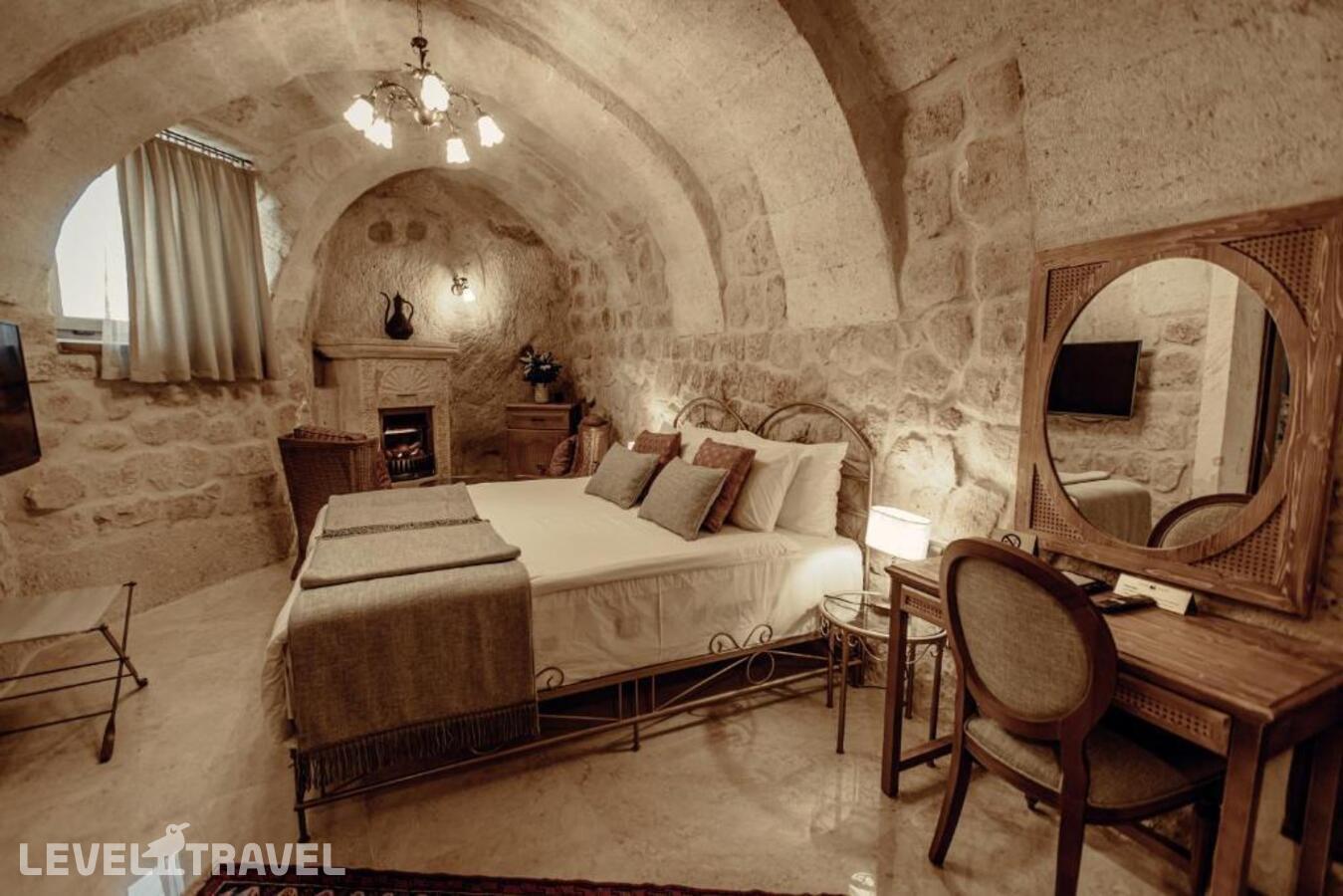 фотографии номера Люкс роскошный отеля Tafoni Houses Cave Hotel в Турция(Ортахисар) - фото №5