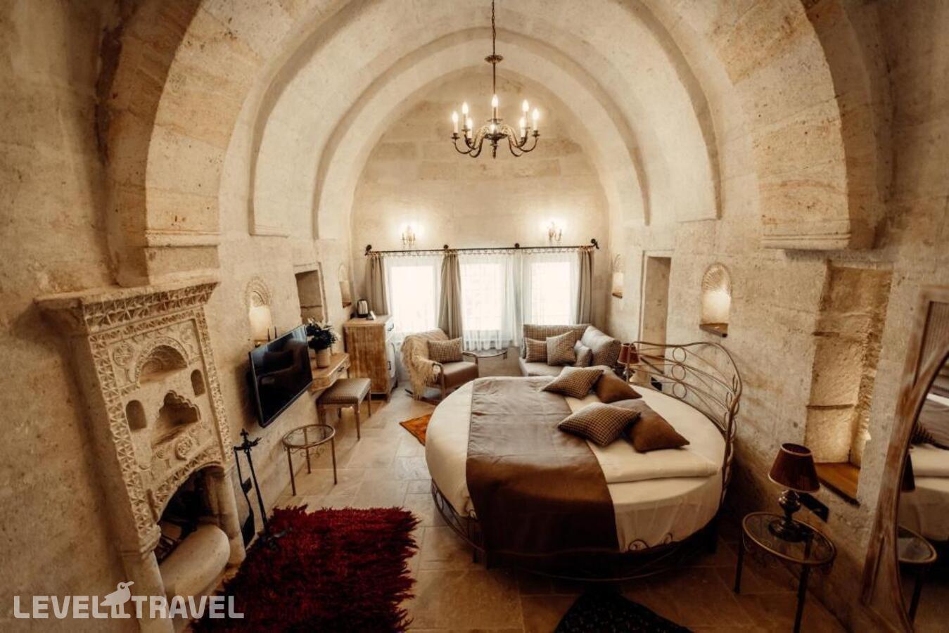 фотографии номера Люкс роскошный отеля Tafoni Houses Cave Hotel в Турция(Ортахисар) - фото №11