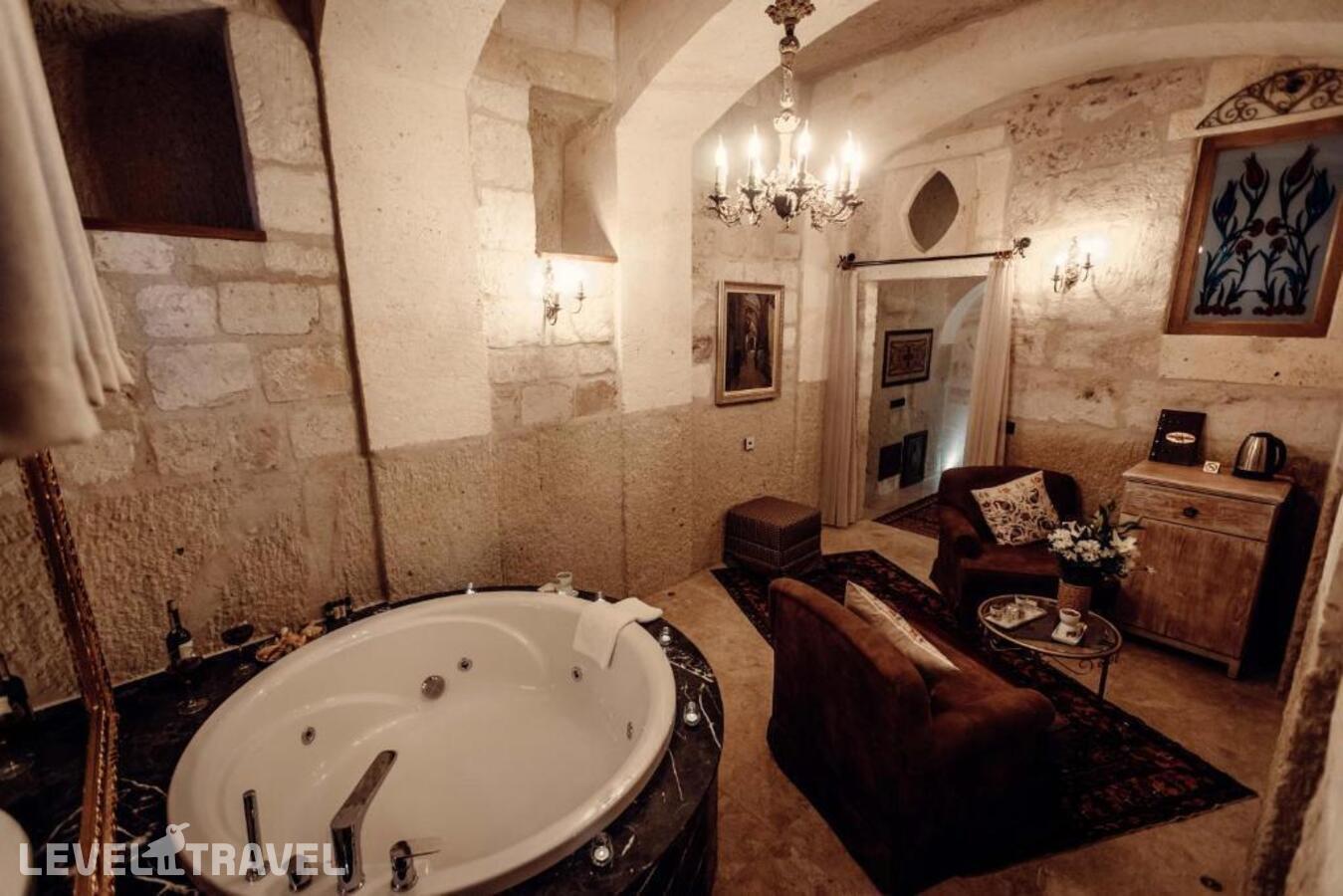 фотографии номера Люкс роскошный отеля Tafoni Houses Cave Hotel в Турция(Ортахисар) - фото №14