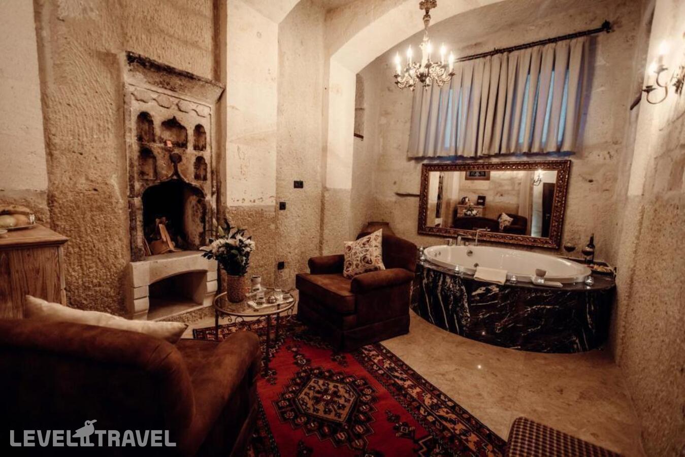 фотографии номера Люкс роскошный отеля Tafoni Houses Cave Hotel в Турция(Ортахисар) - фото №4